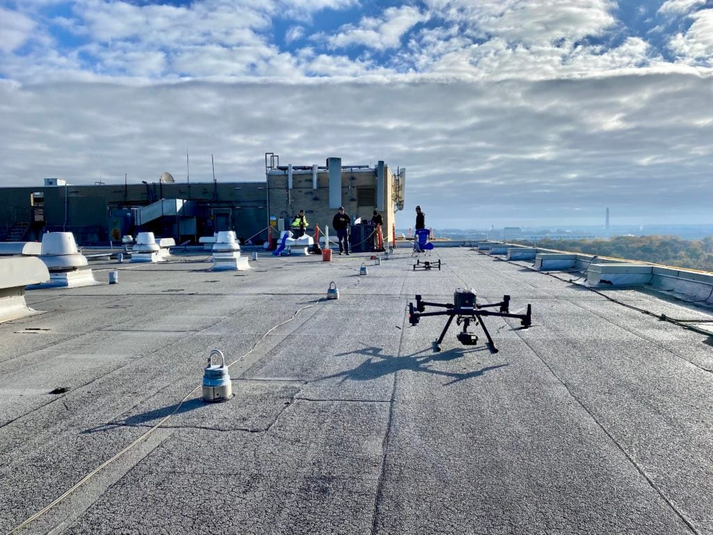 Drone taking off from a rooftop